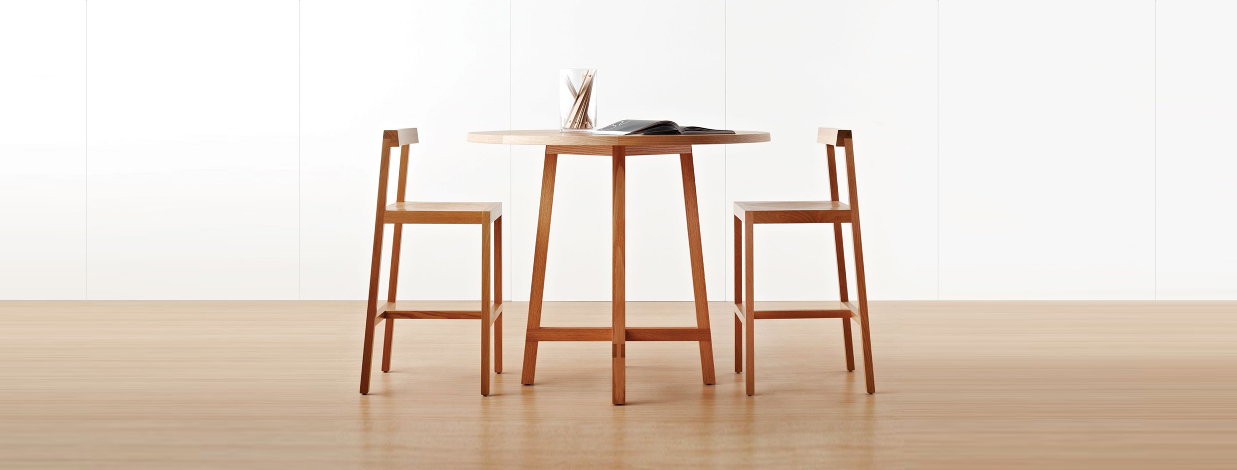 furniture, table, dining table, dining room, room, bar stool, book, publication, chair, desk