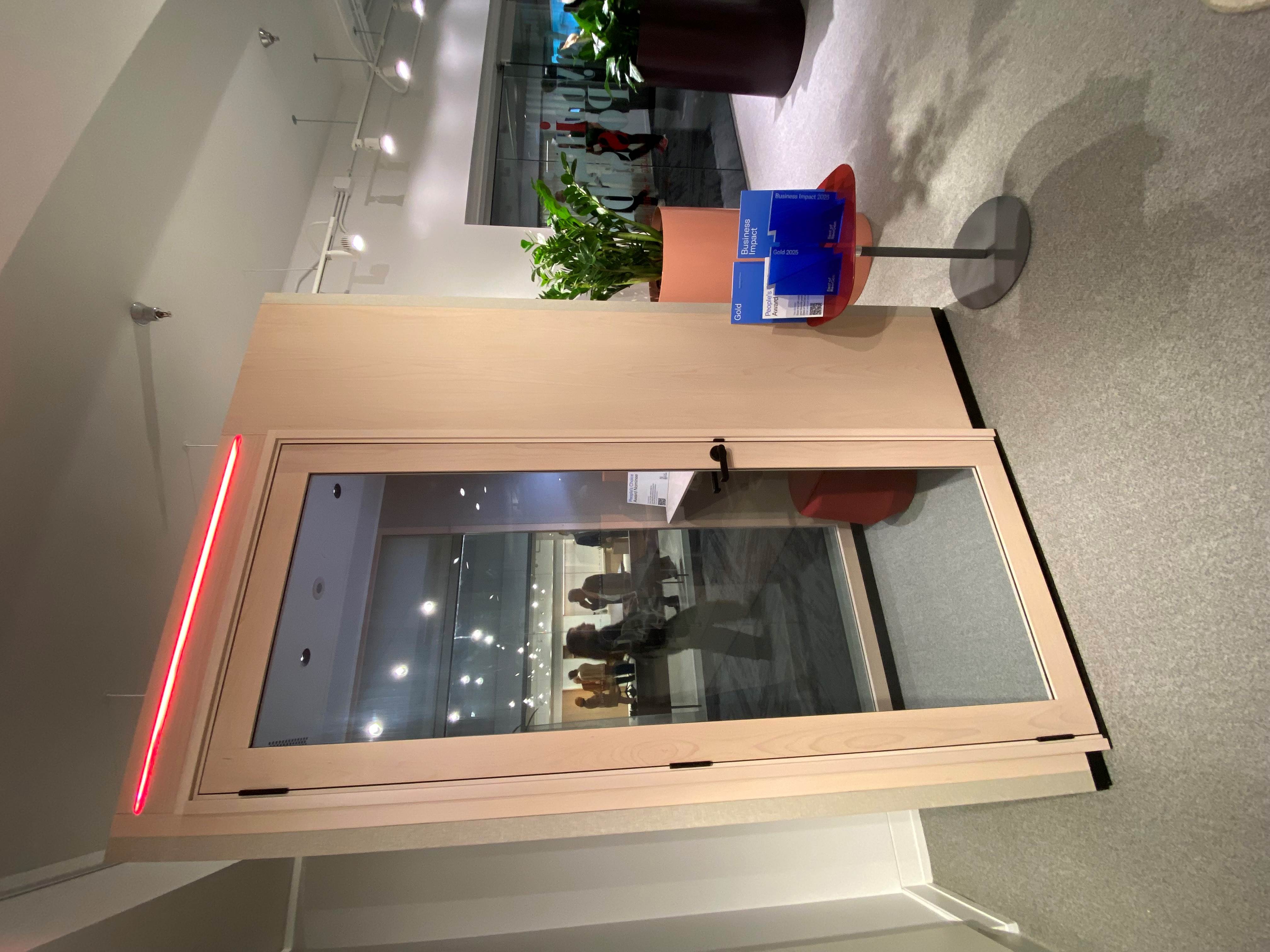 door, plant, person, floor, lighting, furniture, indoors, interior design