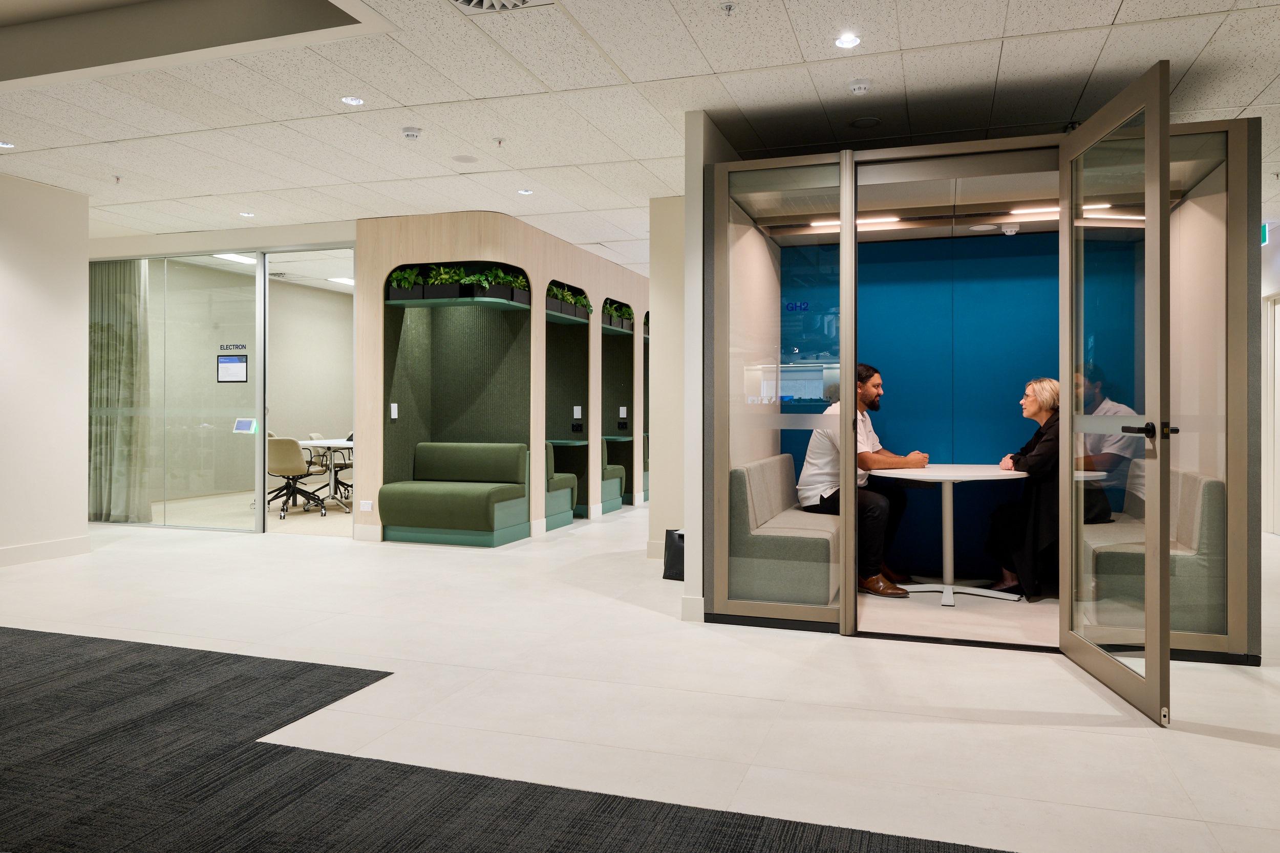 door, desk, furniture, table, person, chair, footwear, shoe, bench, indoors