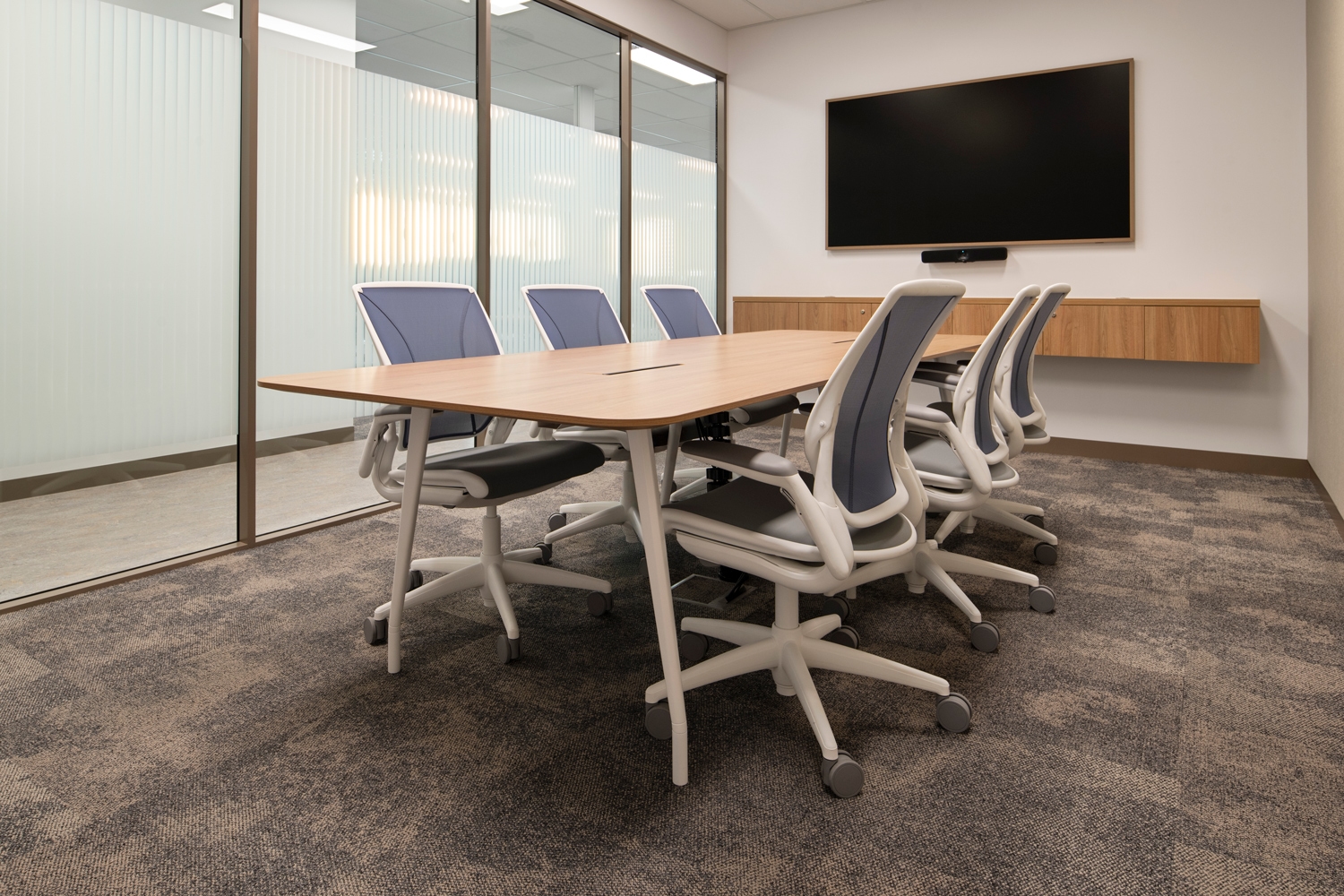 indoors, chair, furniture, meeting room, office, room, screen, computer hardware, monitor, table